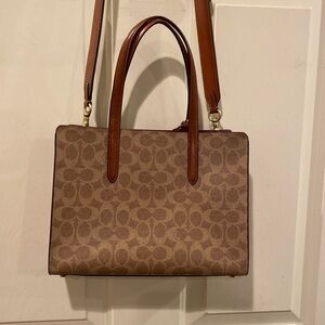 Coach purse 11” wide 8.5” tall; used once.